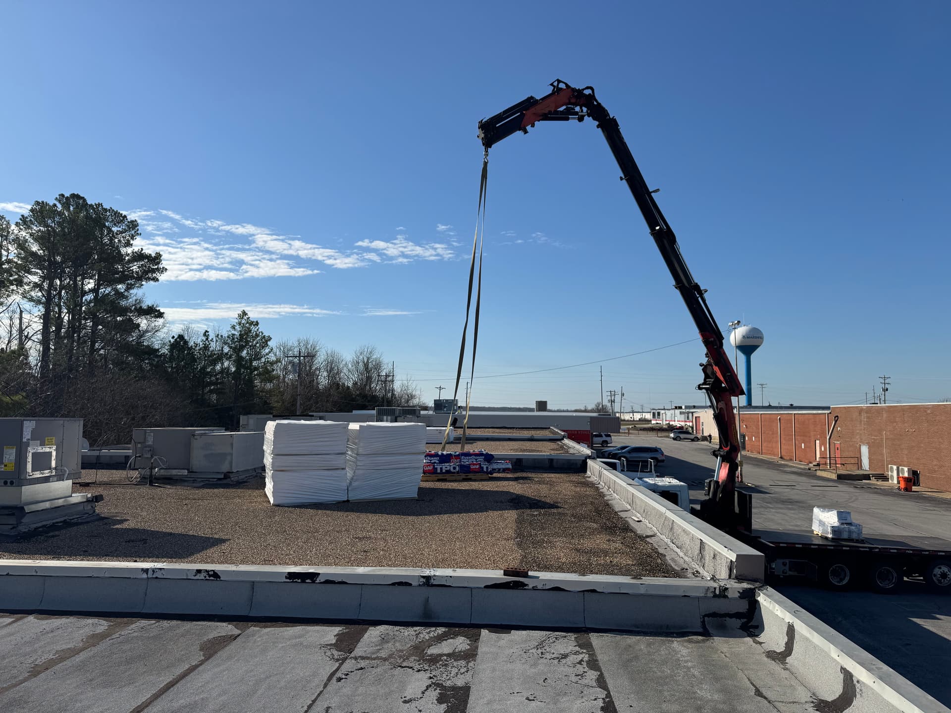 TPO Roofing Installation in Action - Redeemed Roofing Systems image