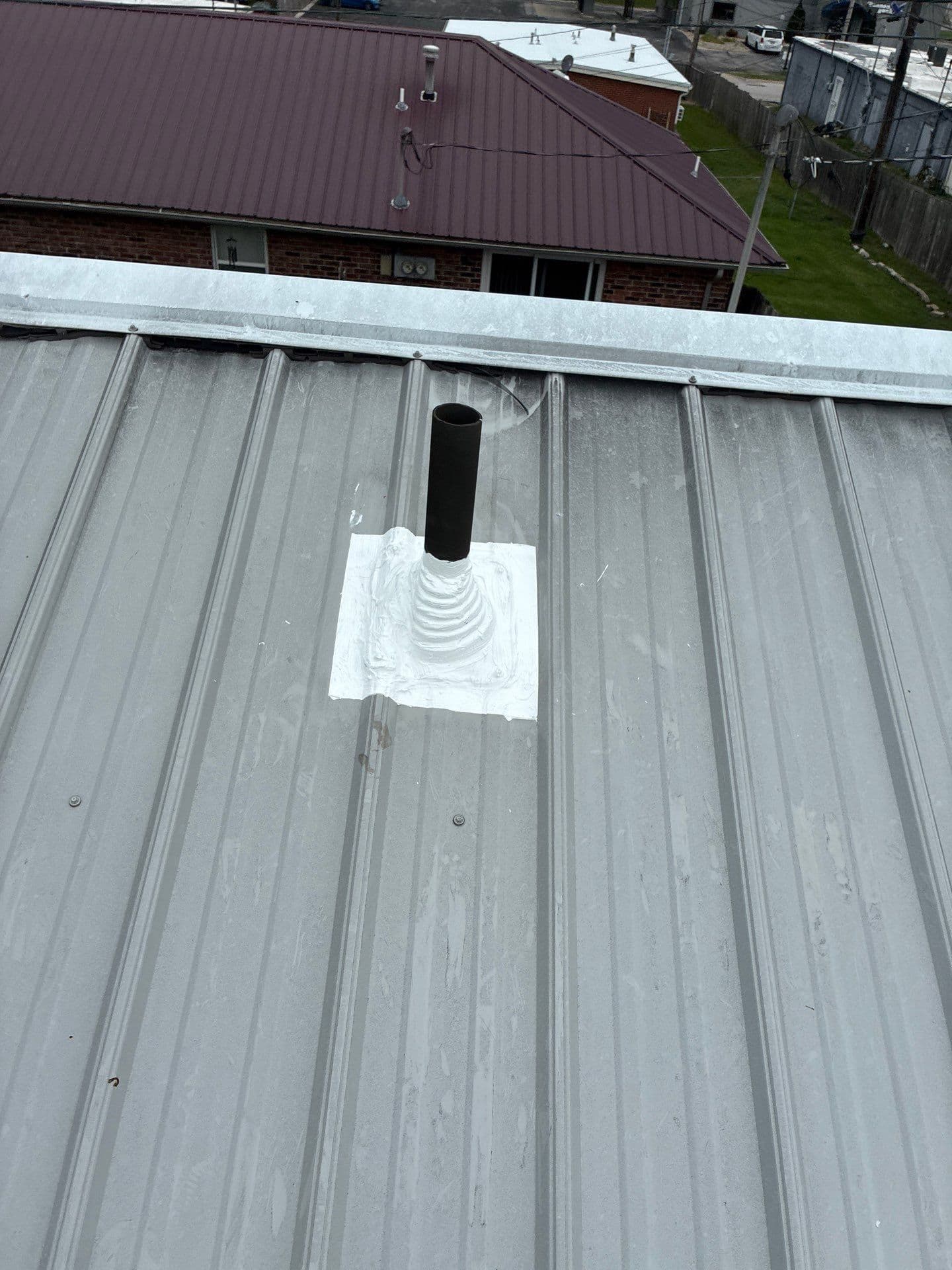 Gallery photos for Chimney and Pipe Sealing on a Metal Roof Done Right: Image #2